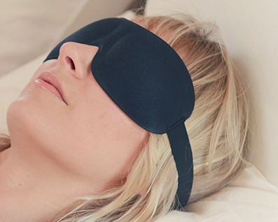 Photo of woman sleeping with the mask on.