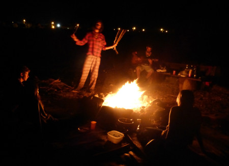 Frederic stocks the fire.