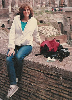 Me wearing my white jacket, holding that day pack and SLR. Only in Rome, not Spain where the cream scam attempted theft happened.